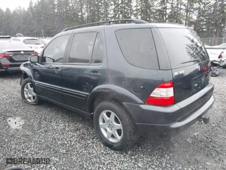 2002 Mercedes-Benz M-Class with VIN 4JGAB54E72A296354, listed as a IAAI auction lot 41277897 with 101,842 mi miles. Bid and sale history available at carsss.com. Image 3.