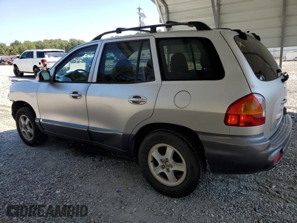 2001 Hyundai Santa Fe GLS with VIN KM8SC83D31U010136, listed as a Copart auction lot 69809604 with 79,823 mi miles and Salvage Title. Bid and sale history available at carsss.com. Image 2.