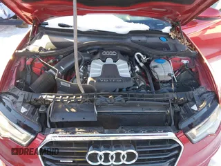 2013 Audi A6 3.0T Prestige with VIN WAUJGAFC5DN030463, listed as a IAAI auction lot 41304345 with 134,216 mi miles. Bid and sale history available at carsss.com. Image 10.