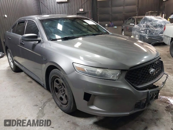 2015 Ford Police Interceptor z VIN 1FAHP2MK4FG119536, wystawiony jako IAAI lot #41635340 z przebiegiem 165 322 mil mil oraz . Historia ofert i sprzedaży dostępna na DreamBid. Obrazek 1.