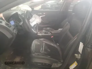 2014 Buick Regal with VIN 2G4GK5EX3E9325407, listed as a Copart auction lot 51769065 with 168,330 mi miles and Salvage title. Bid and sale history available at DreamBid. Image 7.