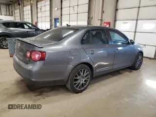 2009 Volkswagen Jetta z VIN 3VWRA71K59M032737, wystawiony jako Copart lot #43270605 z przebiegiem 120 104 mil mil oraz Szkoda całkowita • Salvage title. Historia ofert i sprzedaży dostępna na DreamBid. Obrazek 3.
