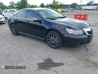 2011 Acura RL Technology z VIN JH4KB2F68BC000256, wystawiony jako IAAI lot #42210558 z przebiegiem 115 289 mil mil oraz . Historia ofert i sprzedaży dostępna na DreamBid. Obrazek 1.