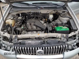 2005 Mercury Mariner Luxury z VIN 4M2CU57105DJ33266, wystawiony jako Copart lot #87002044 z przebiegiem 164 313 mil mil oraz Szkody całkowita. Historia ofert i sprzedaży dostępna na DreamBid. Obrazek 13.