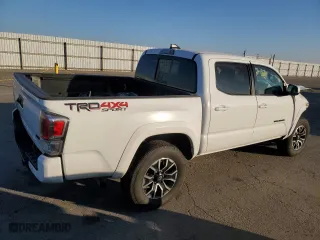 2023 Toyota Tacoma 4WD SR with VIN 3TMCZ5ANXPM545740, listed as a Copart auction lot 41792985 with 58,551 mi miles and Non Repairable. Bid and sale history available at carsss.com. Image 3.