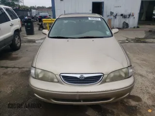 1998 Mazda 626 DX with VIN 1YVGF22C1W5762498, listed as a Copart auction lot 78283944 with 210,639 mi miles and Salvage Title. Bid and sale history available at carsss.com. Image 5.