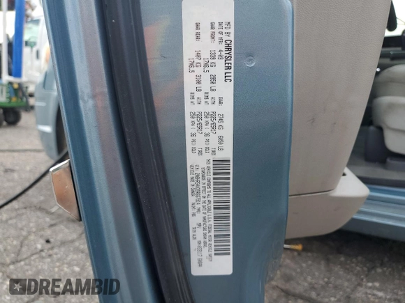 2009 Chrysler Town & Country Touring with VIN 2A8HR54X39R667914, listed as a Copart auction lot 66010904 with 214,583 mi miles and Salvage Title. Bid and sale history available at DreamBid. Image 13.