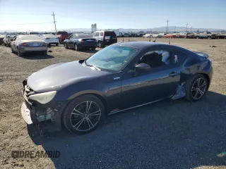 2013 Scion FR-S z VIN JF1ZNAA15D2734378, wystawiony jako Copart lot #64899464 z przebiegiem 133 430 mil mil oraz Szkoda całkowita • Salvage title. Historia ofert i sprzedaży dostępna na DreamBid. Obrazek 1.