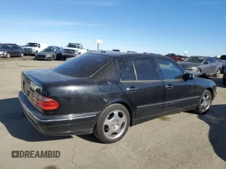 2001 Mercedes-Benz E-Class with VIN WDBJF70JX1B327997, listed as a Copart auction lot 87650175 with 268,045 mi miles and Salvage Title. Bid and sale history available at carsss.com. Image 3.