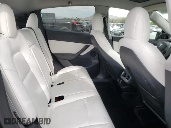 2022 Tesla Model Y Performance with VIN 7SAYGDEF1NF407985, listed as a Copart auction lot 53831325 with 41,225 mi miles and Salvage title. Bid and sale history available at DreamBid. Image 11.