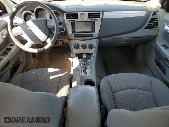 2008 Chrysler Sebring Touring z VIN 1C3LC56K38N300712, wystawiony jako Copart lot #50366285 z przebiegiem 191 210 mil mil oraz Szkoda całkowita • Salvage title. Historia ofert i sprzedaży dostępna na DreamBid. Obrazek 8.