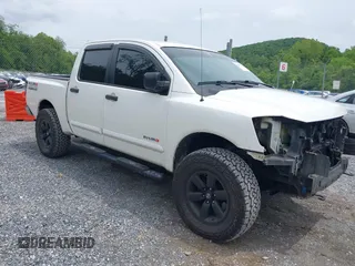 2009 Nissan Titan SE with VIN 1N6AA07C09N312298, listed as a IAAI auction lot 42382255 with 284,398 mi miles and . Bid and sale history available at DreamBid. Image 1.