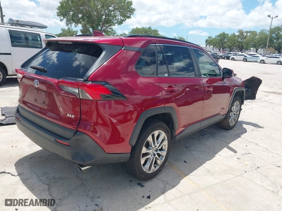 2021 Toyota RAV4 XLE Premium with VIN JTMC1RFV2MD080837, listed as a IAAI auction lot 42049997 with 25,823 mi miles. Bid and sale history available at carsss.com. Image 4.