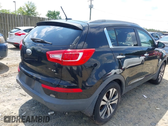 2013 Kia Sportage EX with VIN KNDPCCA21D7457355, listed as a IAAI auction lot 42694813 with 155,879 mi miles and . Bid and sale history available at DreamBid. Image 4.