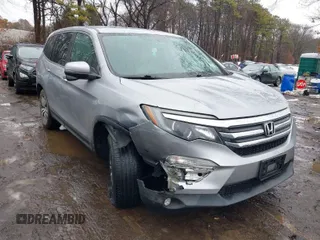 2017 Honda Pilot EX-L with VIN 5FNYF6H51HB069068, listed as a IAAI auction lot 41567728 with 100,618 mi miles and . Bid and sale history available at DreamBid. Image 1.