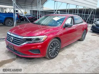 2022 Volkswagen Passat 2.0T Limited Edition with VIN 1VWBA7A30NC010134, listed as a IAAI auction lot 42052451 with 24,923 mi miles. Bid and sale history available at carsss.com. Image 2.