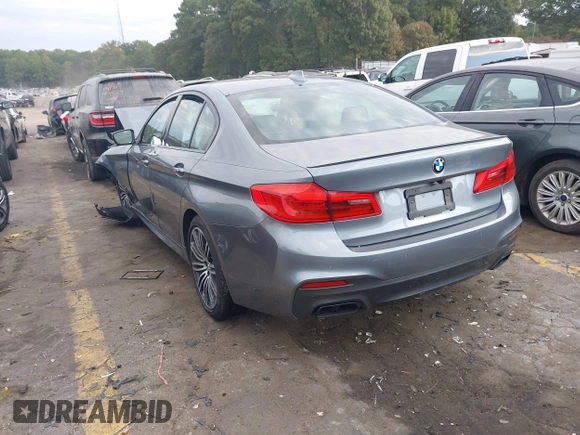2018 BMW 5 Series M550i xDrive with VIN WBAJB9C53JB286035, listed as a IAAI auction lot 40590380 with 57,072 mi miles and . Bid and sale history available at carsss.com. Image 3.