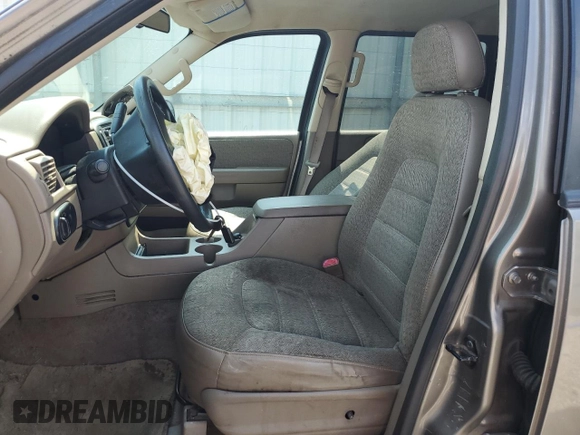 2003 Ford Explorer XLS with VIN 1FMZU72K43UB12036, listed as a Copart auction lot 61124985 with 210,901 mi miles and Salvage title. Bid and sale history available at DreamBid. Image 7.