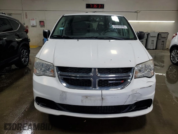 2014 Dodge Grand Caravan SE with VIN 2C4RDGBG6ER230346, listed as a Copart auction lot 50982295 with 173,576 mi miles and Salvage Title. Bid and sale history available at DreamBid. Image 5.