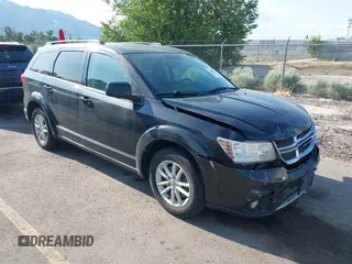 2013 Dodge Journey SXT with VIN 3C4PDDBG1DT606887, listed as a IAAI auction lot 42440507 with 250,836 mi miles and . Bid and sale history available at DreamBid. Image 1.