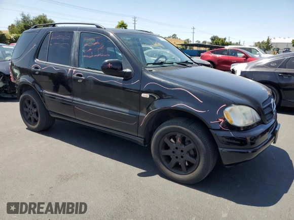 2000 Mercedes-Benz M 320/430/500 with VIN 4JGAB72EXYA193906, listed as a Copart auction lot 62025125 with 142,808 mi miles and Salvage title. Bid and sale history available at DreamBid. Image 4.