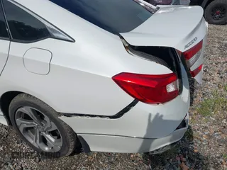 2018 Honda Accord EX with VIN 1HGCV1F40JA048593, listed as a IAAI auction lot 42572510 with 144,604 mi miles and . Bid and sale history available at DreamBid. Image 19.