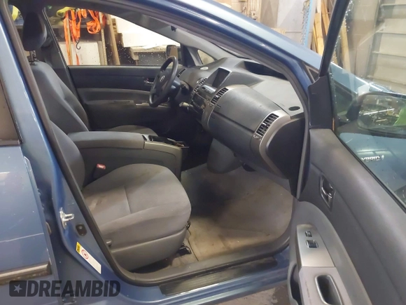 2007 Toyota Prius with VIN JTDKB20U877089190, listed as a IAAI auction lot 42159704 with 140,327 mi miles and . Bid and sale history available at DreamBid. Image 5.
