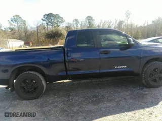 2012 Toyota Tundra 2WD Truck with VIN 5TFRM5F11CX041032, listed as a IAAI auction lot 41744471 with 207,330 mi miles. Bid and sale history available at carsss.com. Image 13.