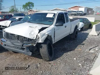 2000 Toyota Tacoma with VIN 5TEWN72N1YZ690947, listed as a IAAI auction lot 41951521 with 207,119 mi miles and . Bid and sale history available at DreamBid. Image 2.