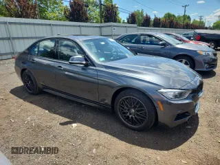 2014 BMW 3 Series 335i xDrive with VIN WBA3B9C58EJ466051, listed as a Copart auction lot 65060915 with Not provided miles and Salvage title. Bid and sale history available at DreamBid. Image 4.