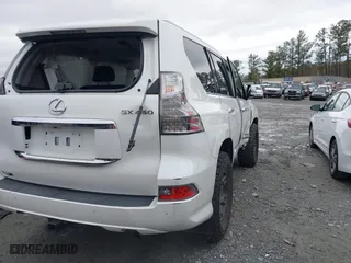 2017 Lexus GX with VIN JTJBM7FX0H5150549, listed as a IAAI auction lot 41247122 with 115,520 mi miles. Bid and sale history available at carsss.com. Image 4.
