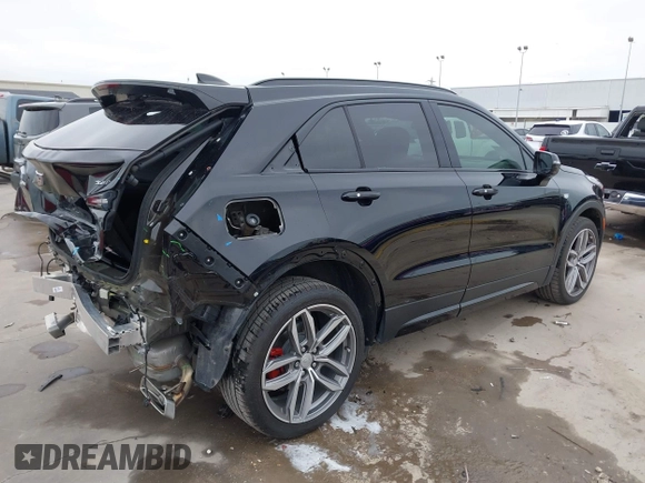2021 Cadillac XT4 FWD Sport with VIN 1GYFZER40MF039140, listed as a IAAI auction lot 41287513 with 51,725 mi miles and . Bid and sale history available at DreamBid. Image 4.