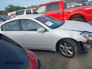 2005 Nissan Maxima SE with VIN 1N4BA41E55C806063, listed as a IAAI auction lot 41888711 with 104,040 mi miles and . Bid and sale history available at DreamBid. Image 14.