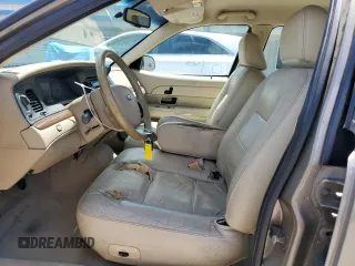 2006 Ford Crown Victoria LX z VIN 2FAFP74V56X126245, wystawiony jako Copart lot #56598055 z przebiegiem 91 400 mil mil oraz Szkody całkowita. Historia ofert i sprzedaży dostępna na DreamBid. Obrazek 7.