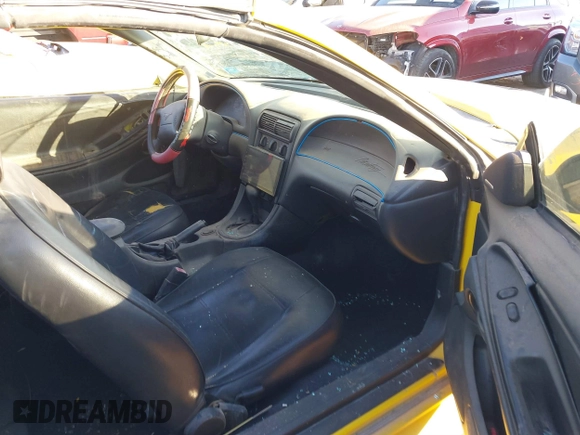 2004 Ford Mustang Deluxe with VIN 1FAFP44684F185726, listed as a IAAI auction lot 41291274 with 170,902 mi miles. Bid and sale history available at carsss.com. Image 5.