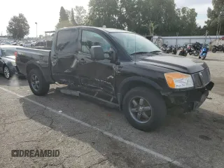 2013 Nissan Titan SL with VIN 1N6BA0EC9DN306161, listed as a Copart auction lot 50923005 with 199,141 mi miles and Salvage Title. Bid and sale history available at DreamBid. Image 4.