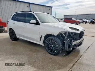 2021 BMW X5 xDrive40i with VIN 5UXCR6C04M9D99175, listed as a Copart auction lot 57660895 with 60,763 mi miles and Clean title. Bid and sale history available at DreamBid. Image 4.