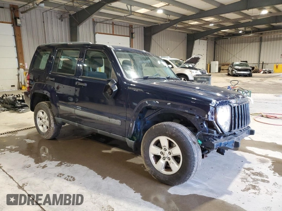 2012 Jeep Liberty Sport with VIN 1C4PJMAK1CW129000, listed as a Copart auction lot 49472635 with 77,124 mi miles and Salvage Title. Bid and sale history available at DreamBid. Image 4.