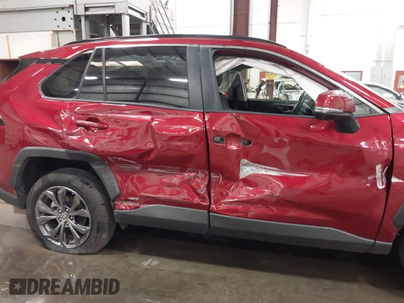 2023 Toyota RAV4 Hybrid XLE Premium with VIN JTMB6RFV4PD116495, listed as a IAAI auction lot 42588604 with 24,258 mi miles and . Bid and sale history available at DreamBid. Image 6.