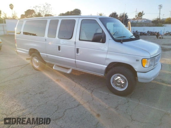1999 Ford Econoline Passenger XL with VIN 1FBSS31L6XHC07800, listed as a Copart auction lot 83122494 with 96,238 mi miles and Clean Title. Bid and sale history available at DreamBid. Image 4.