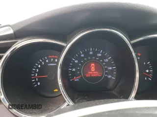 2012 Kia Optima LX z VIN 5XXGM4A73CG033597, wystawiony jako Copart lot #59585515 z przebiegiem 141 577 mil mil oraz Szkoda całkowita • Salvage title. Historia ofert i sprzedaży dostępna na DreamBid. Obrazek 9.