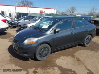 2009 Toyota Yaris with VIN JTDBT903194047784, listed as a IAAI auction lot 42049872 with 115,735 mi miles. Bid and sale history available at carsss.com. Image 2.