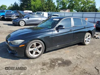 2014 BMW 3 Series 320i xDrive with VIN WBA3C3G57ENS71376, listed as a Copart auction lot 60874995 with Not provided miles and Salvage title. Bid and sale history available at DreamBid. Image 1.