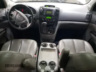 2012 Kia Sedona EX with VIN KNDMH4C7XC6483296, listed as a Copart auction lot 76624984 with 203,980 mi miles and Salvage Title. Bid and sale history available at carsss.com. Image 8.