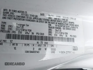 2015 Ford Focus SE with VIN 1FADP3F23FL329375, listed as a IAAI auction lot 42170945 with 114,180 mi miles. Bid and sale history available at carsss.com. Image 9.