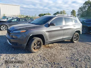 2015 Jeep Cherokee Limited with VIN 1C4PJMDS4FW659798, listed as a IAAI auction lot 40482812 with 65,453 mi miles. Bid and sale history available at carsss.com. Image 2.