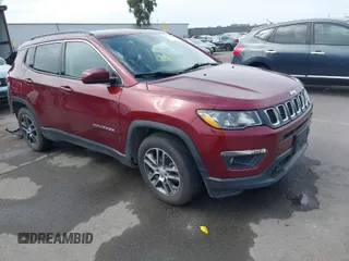 2020 Jeep Compass Latitude with VIN 3C4NJCBB3LT257809, listed as a IAAI auction lot 41736438 with 50,435 mi miles and . Bid and sale history available at carsss.com. Image 1.