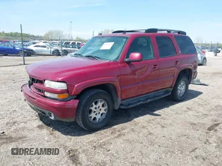 2005 Chevrolet Tahoe LT z VIN 1GNEK13T25R261555, wystawiony jako IAAI lot #42060225 z przebiegiem 151 190 mil mil oraz . Historia ofert i sprzedaży dostępna na DreamBid. Obrazek 2.