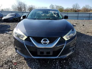 2016 Nissan Maxima SV with VIN 1N4AA6AP2GC434063, listed as a Copart auction lot 52179995 with 106,761 mi miles and Salvage Title. Bid and sale history available at carsss.com. Image 5.