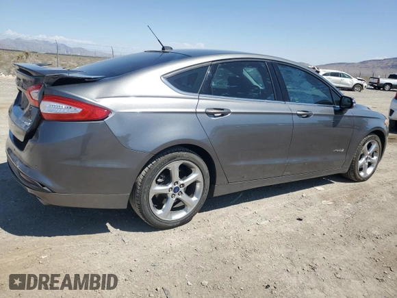 2014 Ford Fusion SE Hybrid with VIN 3FA6P0LU3ER306739, listed as a Copart auction lot 69887454 with 114,150 mi miles and Salvage title. Bid and sale history available at DreamBid. Image 3.